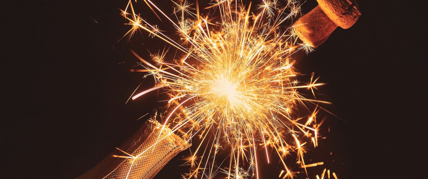 a bottle of champagne with sparklers at The Ellwood at Lake Travis